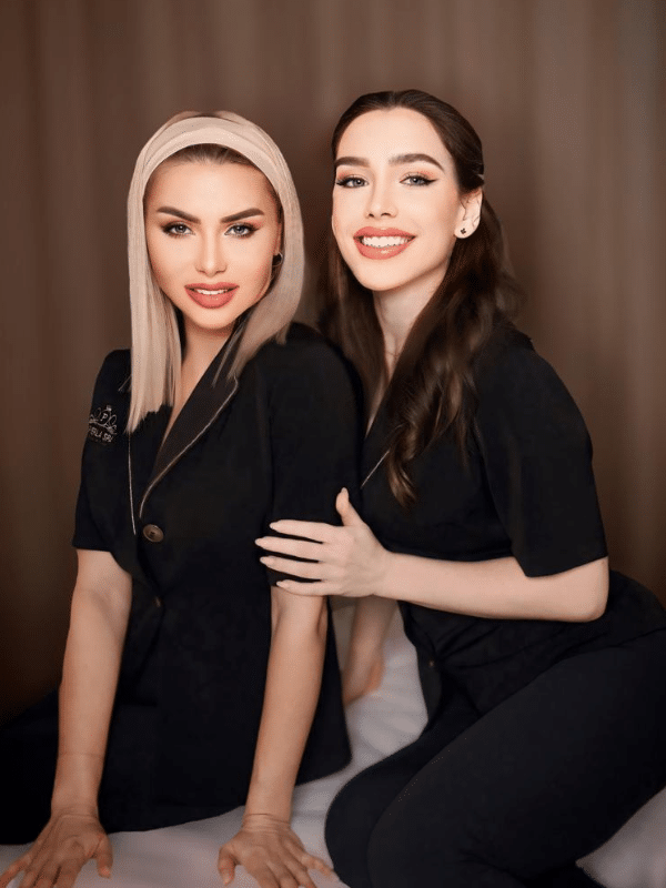 Therapists providing synchronized 4 Hands Massage La Perla Dubai